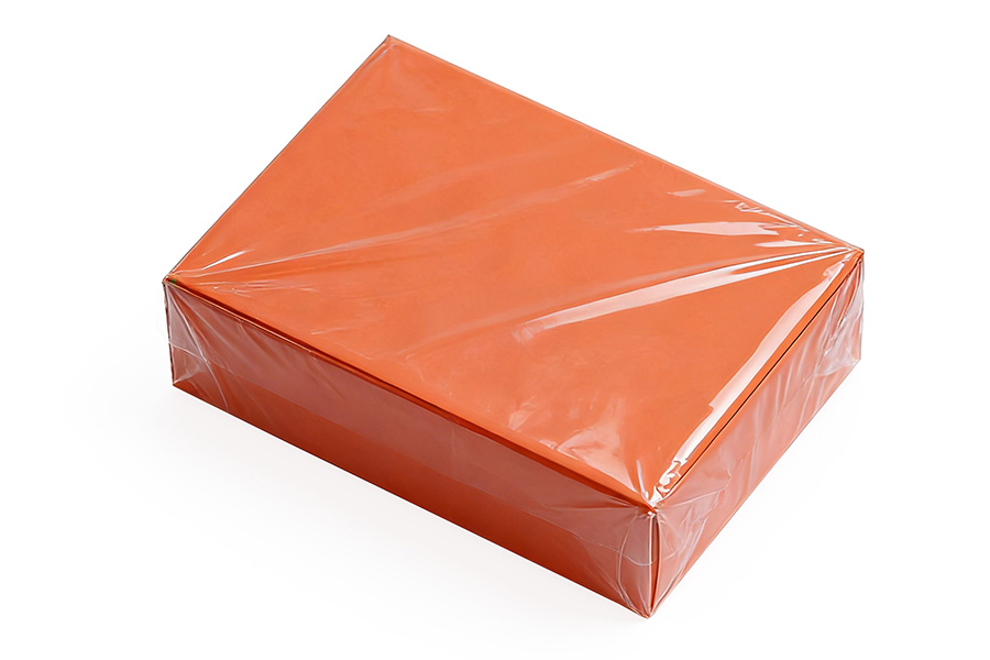 Card box sealed in tight shrink film, ready for retail or export packing